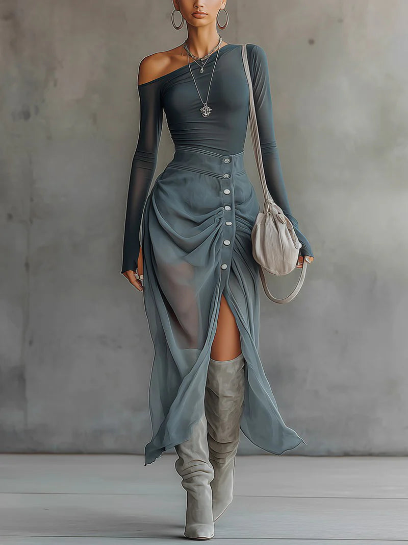 Conjunto Asimétrico Gris con Transparencias y Detalle Cut Out