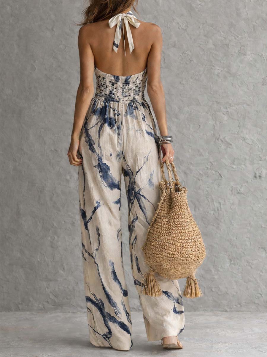 Mono de corte ancho con cuello halter, estampado difuminado y bolsillos