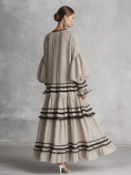 Vestido largo boho de rayas con volantes y manga larga