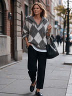 Jersey de punto gris y blanco con capucha
