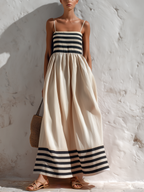 Long black and beige striped dress with thin straps