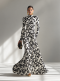 Vestido cruzado elástico estampado en blanco y negro
