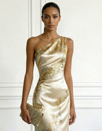 Champagne Colored Printed Satin One Shoulder Fishtail Maxi Dress