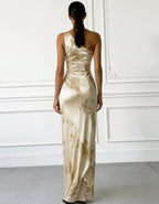Champagne Colored Printed Satin One Shoulder Fishtail Maxi Dress