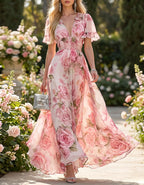 Abito lungo in chiffon con scollo a V e stampa di rose rosa