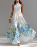 Robe longue en mousseline blanche à motif floral aquarelle bleu