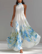 Robe longue en mousseline blanche à motif floral aquarelle bleu