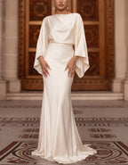 Robe longue en satin blanc à manches chauve-souris