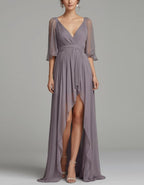 Abito lungo con scollo a V in chiffon viola grigiastro, maniche in tulle e orlo asimmetrico