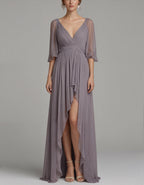 Abito lungo con scollo a V in chiffon viola grigiastro, maniche in tulle e orlo asimmetrico