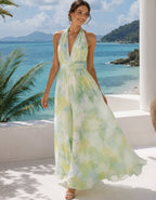 Robe longue en mousseline vert jaune à dos nu et décolleté plongeant en V
