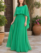 Robe longue en mousseline unie à col rond et manches à volants