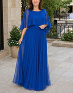 Robe longue en mousseline unie à col rond et manches à volants