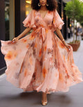 Robe longue en mousseline à imprimé floral aquarelle rose, col en V et manches à volants avec lien à nouer