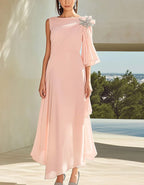 Robe longue rose en mousseline à encolure bateau et épaule dénudée plissée