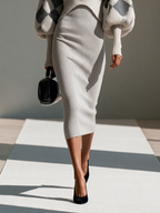 Conjunto de torera corta de rombos con mangas abullonadas y vestido midi de canalé