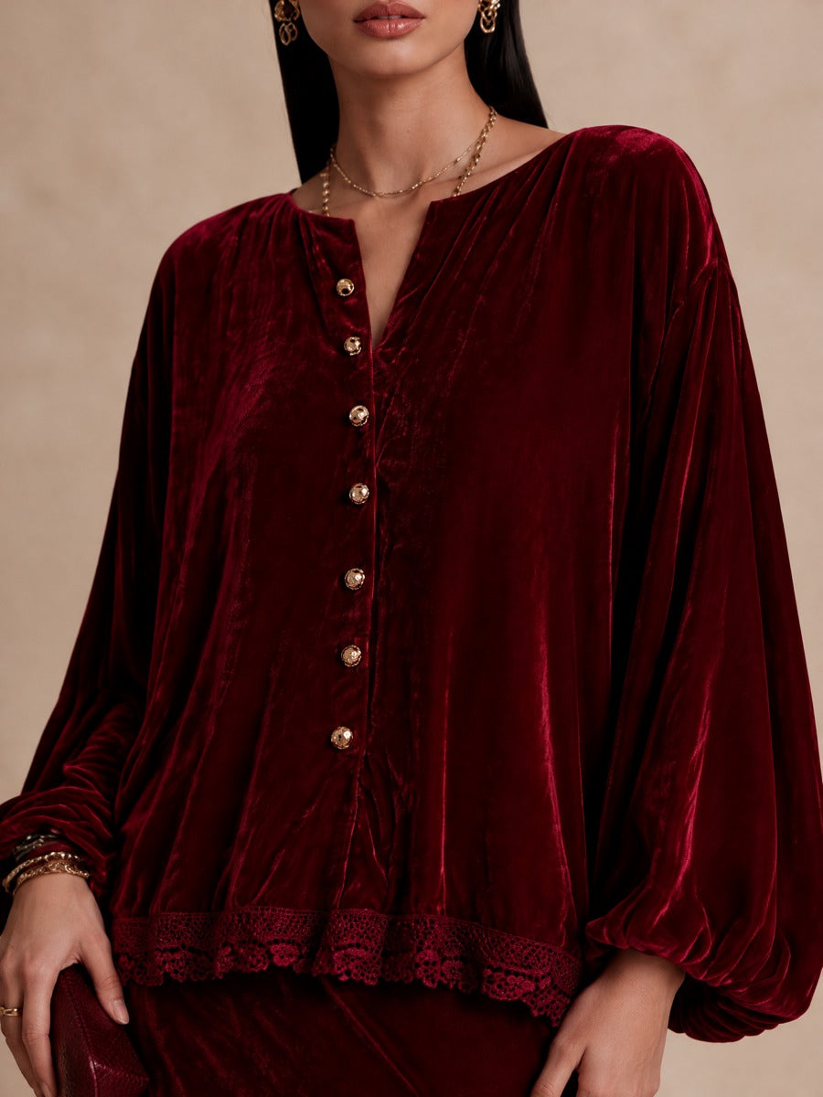 Conjunto de blusa con mangas globo y falda larga con ribete de encaje