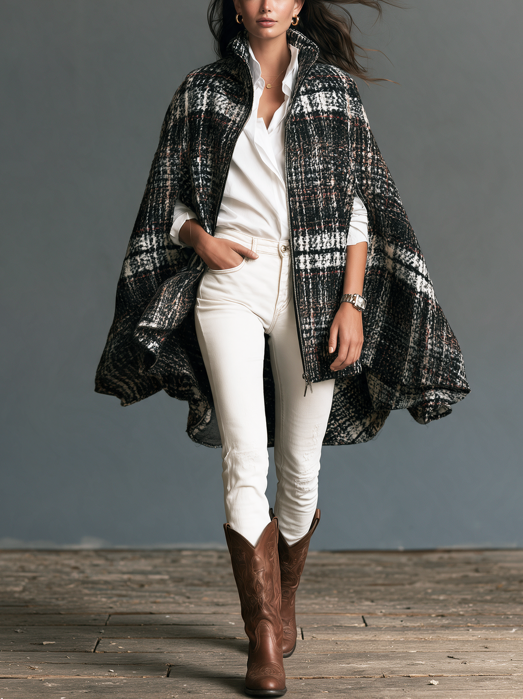 Chaqueta capa sin mangas en blanco y negro