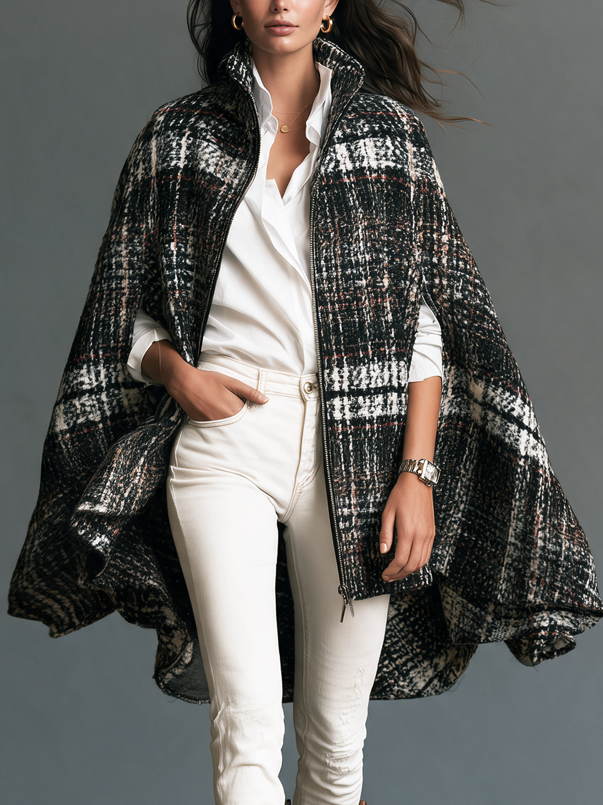 Chaqueta capa sin mangas en blanco y negro