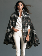 Chaqueta capa sin mangas en blanco y negro
