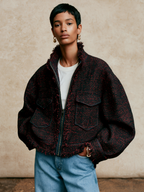 Chaqueta corta de tweed con cuello alzado y bordes deshilachados