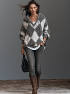 Jersey de punto gris y blanco con capucha