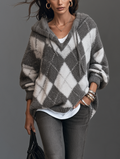 Jersey de punto gris y blanco con capucha