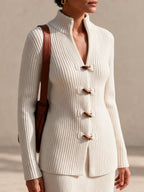 Conjunto de top de canalé con trencas y falda midi