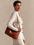 Top largo de canalé con cuello alzado y trencas