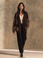 Chaqueta larga de punto café con paneles de leopardo