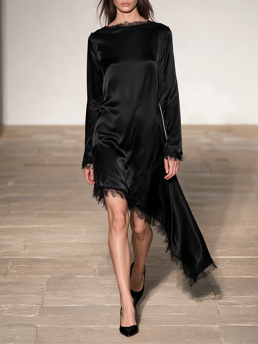 Vestido midi asimétrico negro satinado con flecos