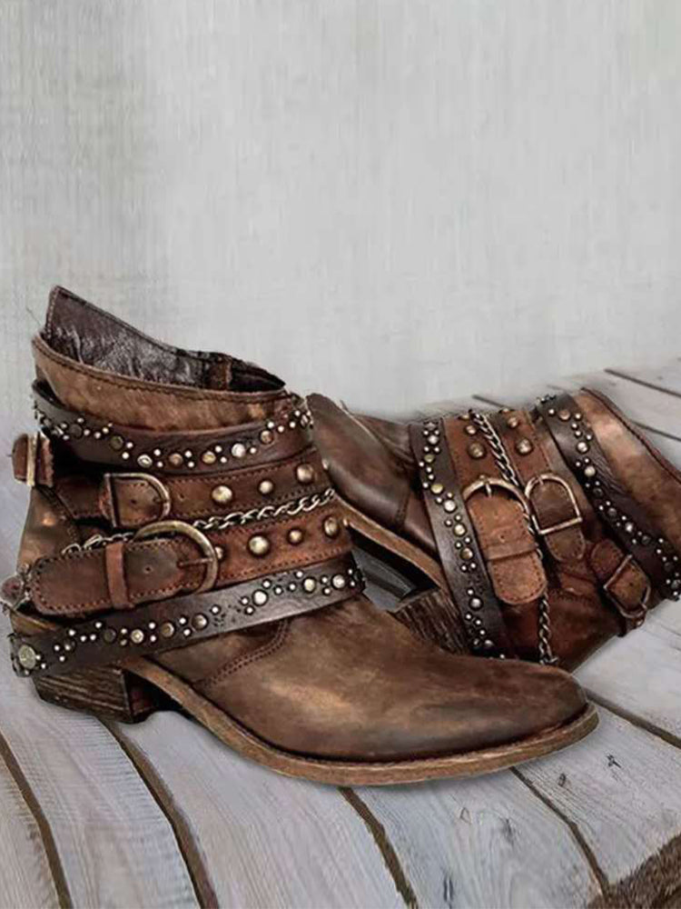 Vintagekängor med spännen och nitar, tvättad look