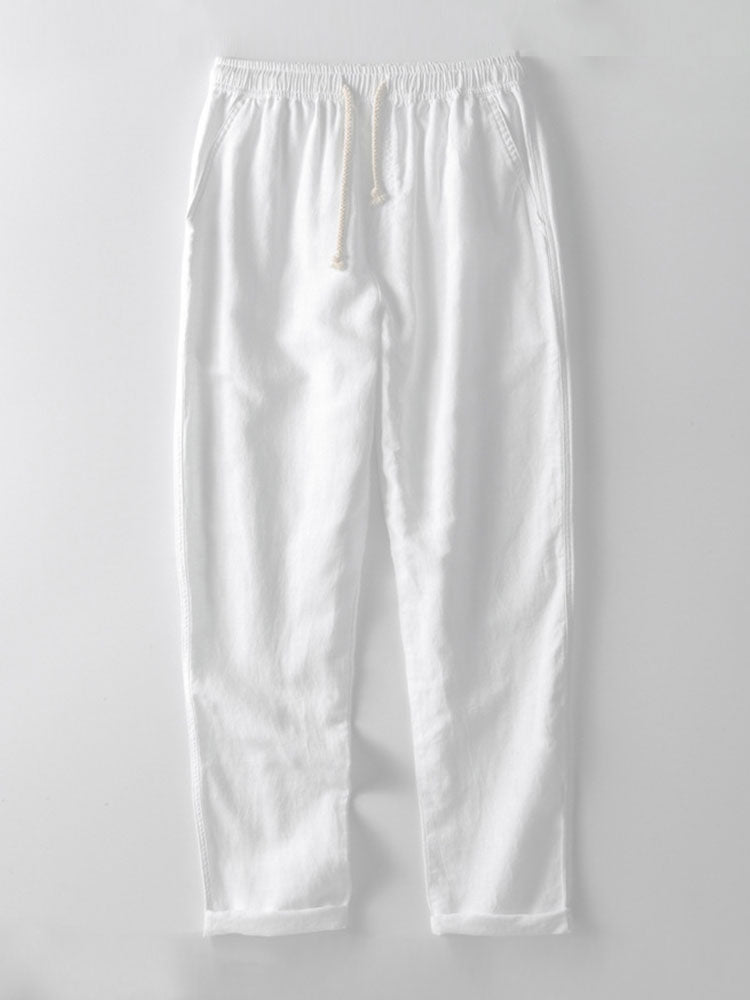 Camisa de manga corta con botones y efecto lino, y pantalones rectos de lino