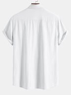 Camisa de manga corta con botones y efecto lino, y pantalones rectos con textura arrugada