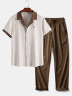 Camisa arrugada con bordado de palmeras en contraste y pantalones rectos con textura arrugada