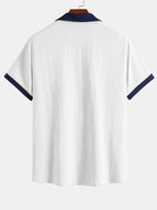 Camisa arrugada con bordado de palmeras en contraste y pantalones cortos de 12,7 cm con cordón y textura arrugada