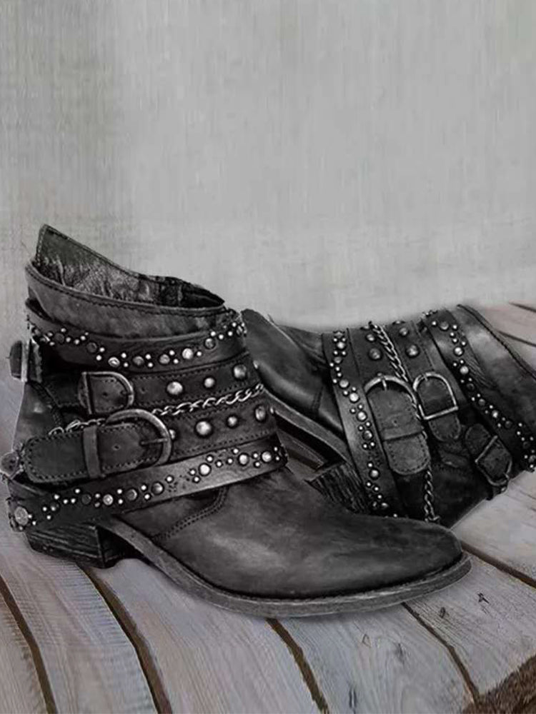 Vintagekängor med spännen och nitar, tvättad look