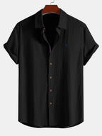 Camisa de manga corta con botones y efecto lino, y pantalones rectos de lino
