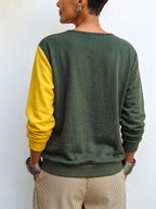 Maglia a maglia bicolore asimmetrica