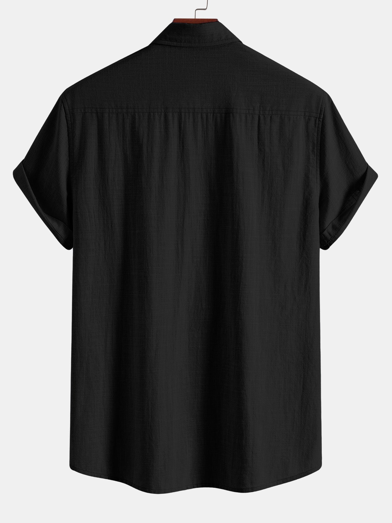 Camisa de manga corta con botones y efecto lino, y pantalones rectos con textura arrugada