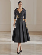 Elegant Satin Midi Dress with Embroidered Floral Appliqué and Folded Lapel Neckline