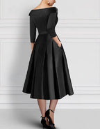 Elegant Satin Midi Dress with Embroidered Floral Appliqué and Folded Lapel Neckline