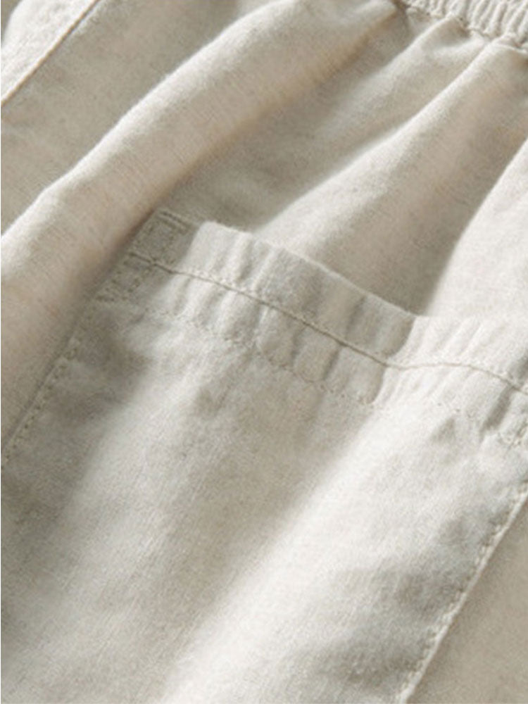 Camisa de manga corta con botones y efecto lino, y pantalones rectos de lino