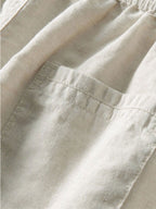 Camisa de manga corta con botones y efecto lino, y pantalones rectos de lino