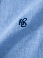 Camisa de manga corta con botones y efecto lino, y pantalones rectos de lino