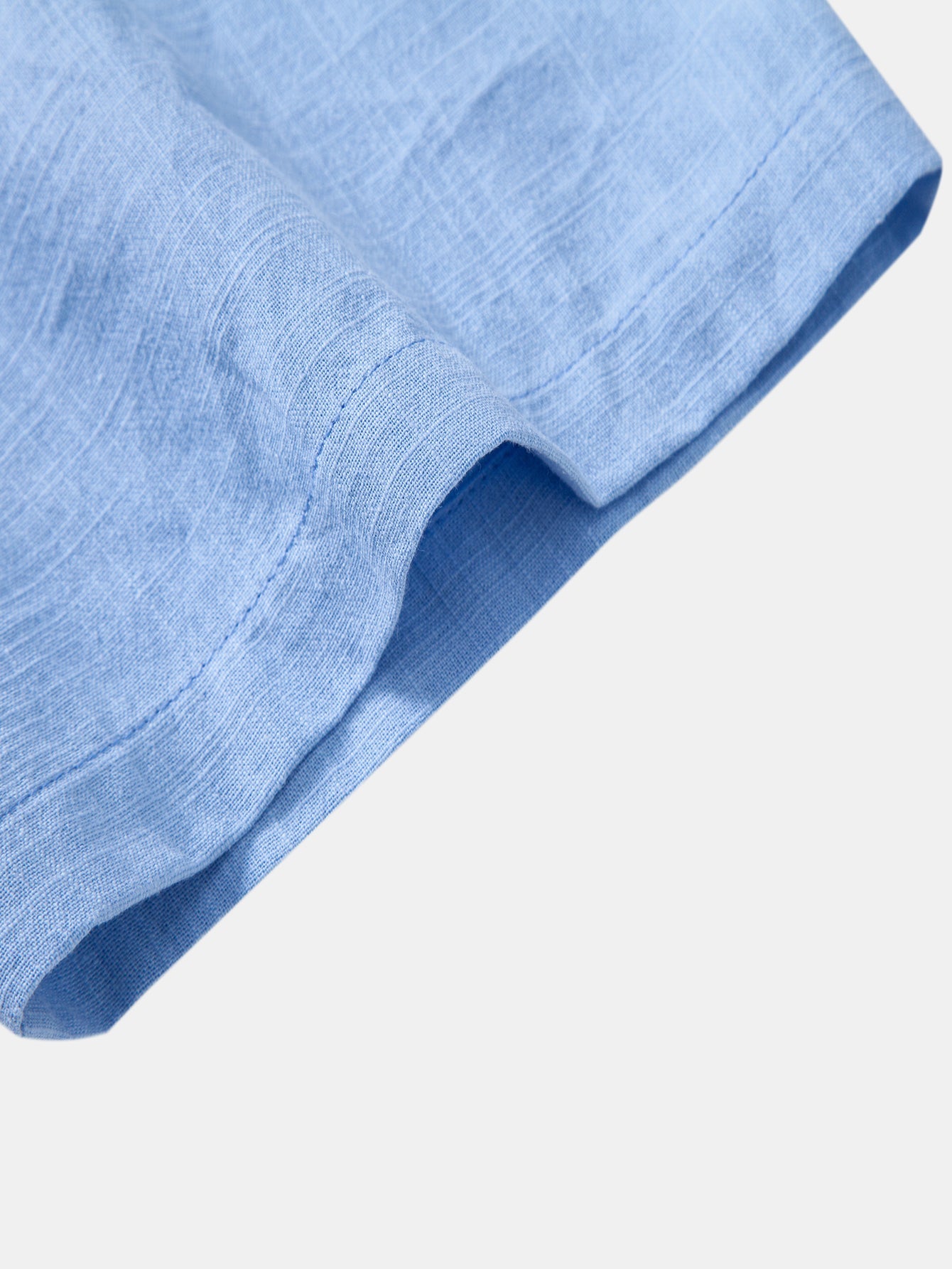 Camisa de manga corta con botones y efecto lino, y pantalones rectos de lino