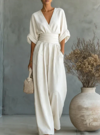 Elegant V-neck high-waisted loose-fit jumpsuit.