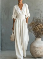 Elegant V-neck high-waisted loose-fit jumpsuit.