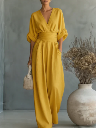 Elegant V-neck high-waisted loose-fit jumpsuit.