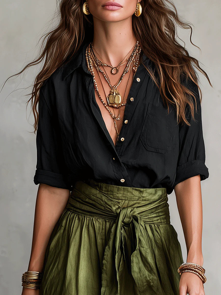 Conjunto de dos piezas con camisa negra y falda midi para mujer